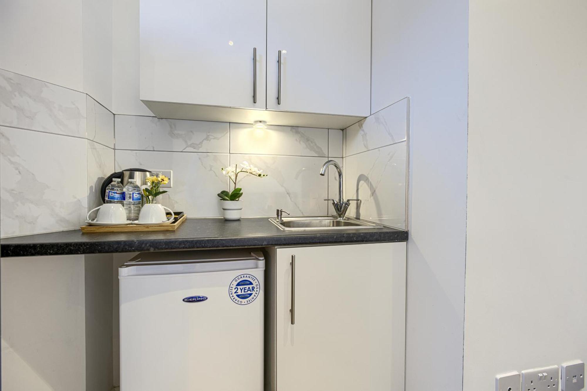 The Finsbury Deluxe Apartments Лондон Номер фото